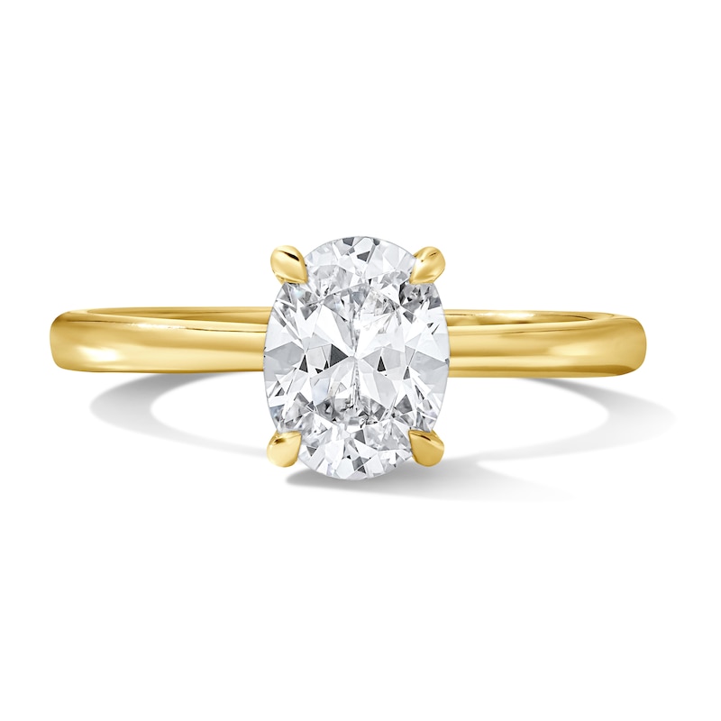 1.06 CT. T.W. Oval Certified Center Diamond Solitaire Engagement Ring 18K Gold (F/SI2)
