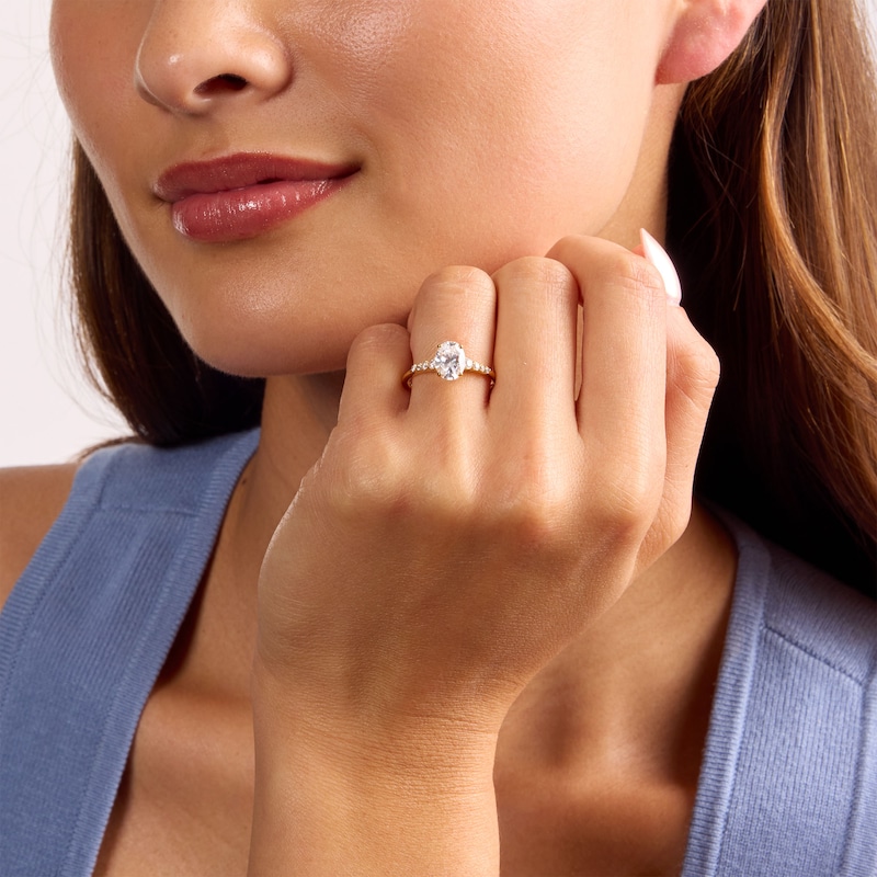 1.13 CT. T.W. Certified Oval Lab-Grown Diamond Engagement Ring 14K Gold (F/VS2)