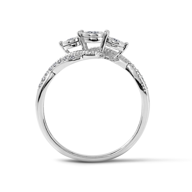 0.20 CT. T.W. Diamond Three-Stone Swirl Engagement Ring in 10K Gold