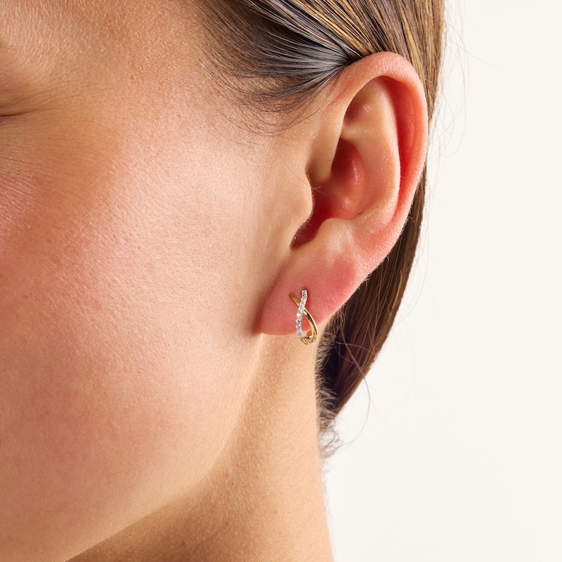 0.10 CT. T.W. Lab-Grown Diamond Curved Crossover Hoop Earrings in Sterling Silver with 14K Yellow Gold Plate (F/SI2)