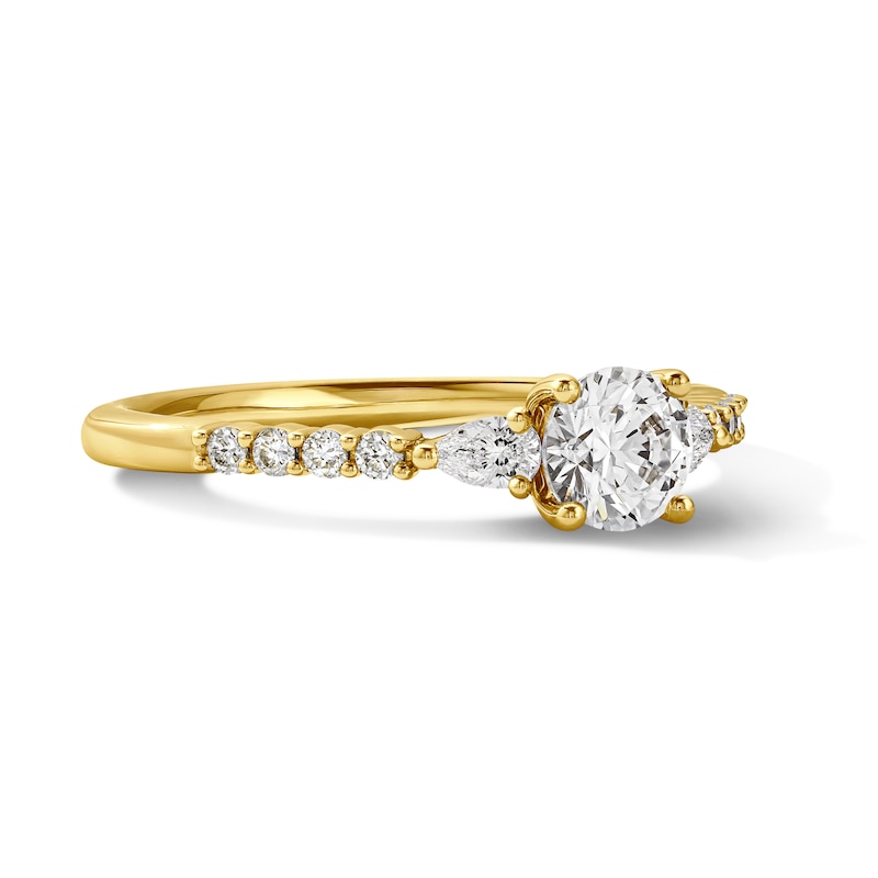 0.70 CT. T.W. Canadian Certified Diamond Three-Stone Engagement Ring in 14K Gold (I/I1)