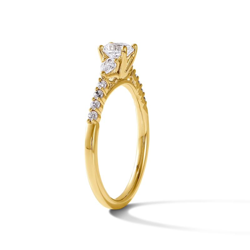 0.70 CT. T.W. Canadian Certified Diamond Three-Stone Engagement Ring in 14K Gold (I/I1)