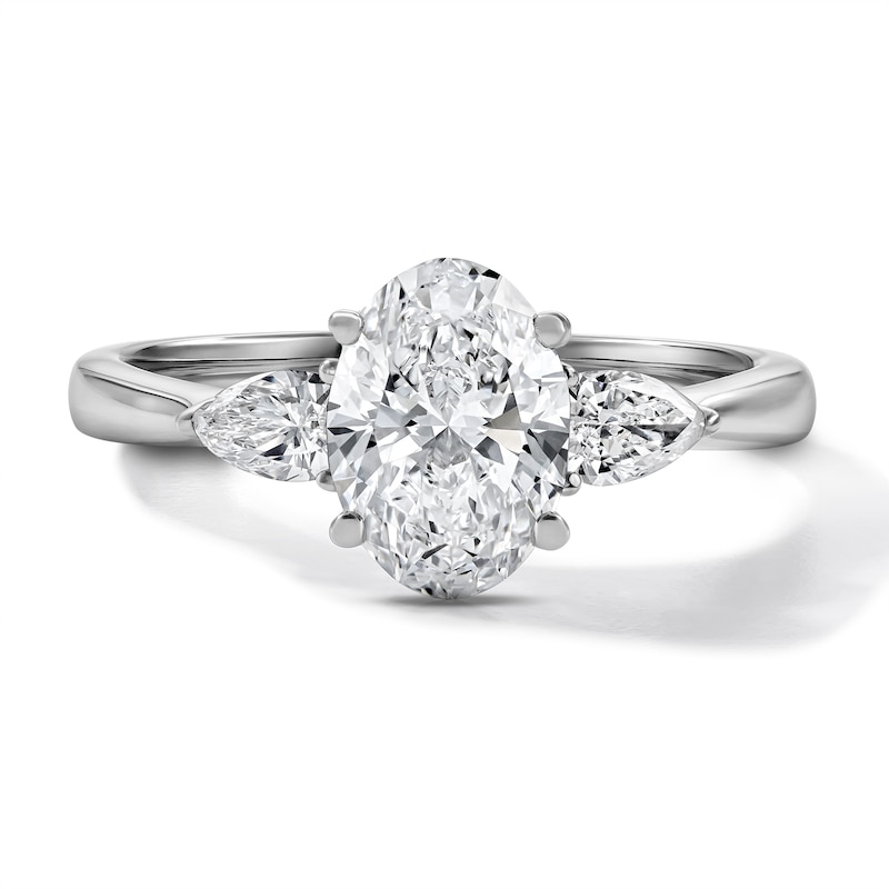 1.55 CT. T.W. Certified Oval and Pear-Shaped Lab-Grown Diamond Three-Stone Engagement Ring in 14K Gold (F/VS2