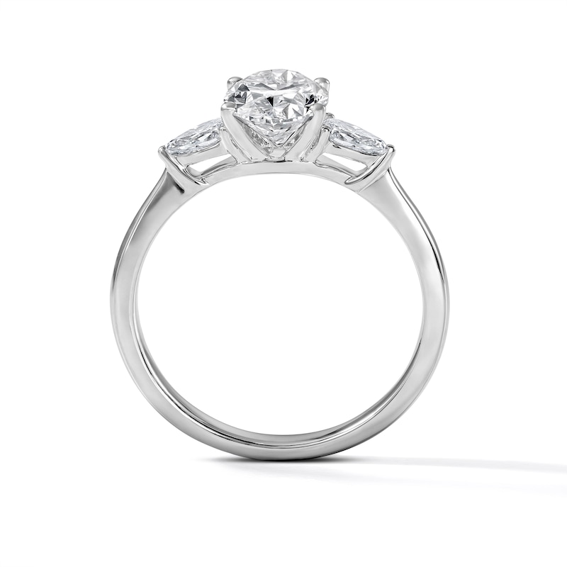 1.55 CT. T.W. Certified Oval and Pear-Shaped Lab-Grown Diamond Three-Stone Engagement Ring in 14K Gold (F/VS2