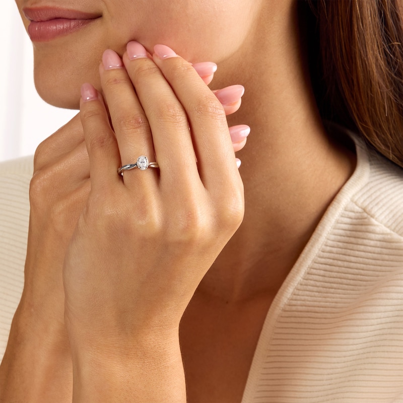 0.20 CT. T.W. Oval Lab-Grown Diamond Milgrain Frame Promise Ring 10K White Gold (F/VS2)