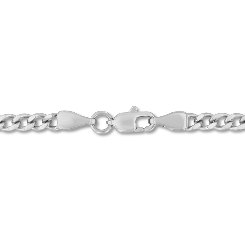 0.15 CT. T.W. Diamond Cross Necklace in Stainless Steel - 24"