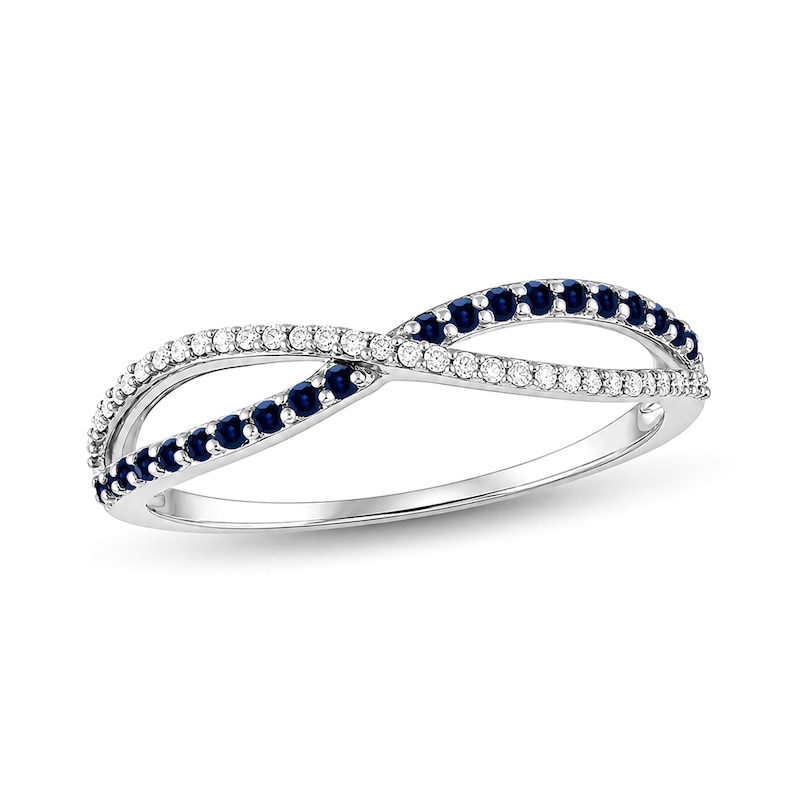 Blue Sapphire and 0.065 CT. T.W. Diamond Crossover Ring 10K White Gold