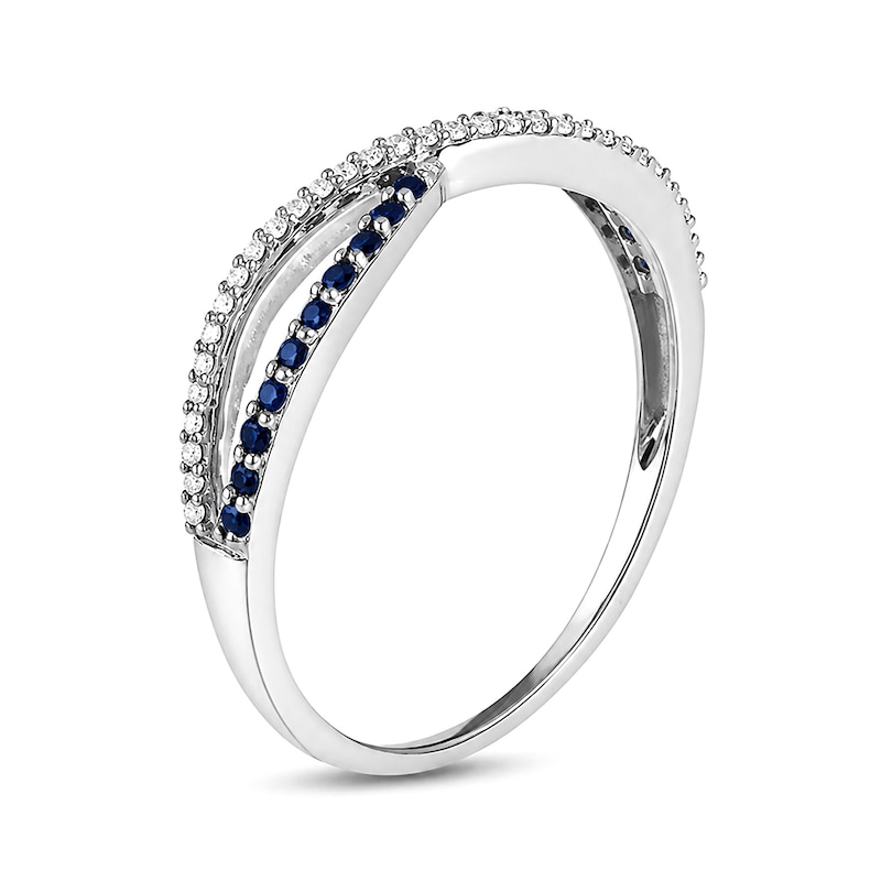 Blue Sapphire and 0.065 CT. T.W. Diamond Crossover Ring 10K White Gold