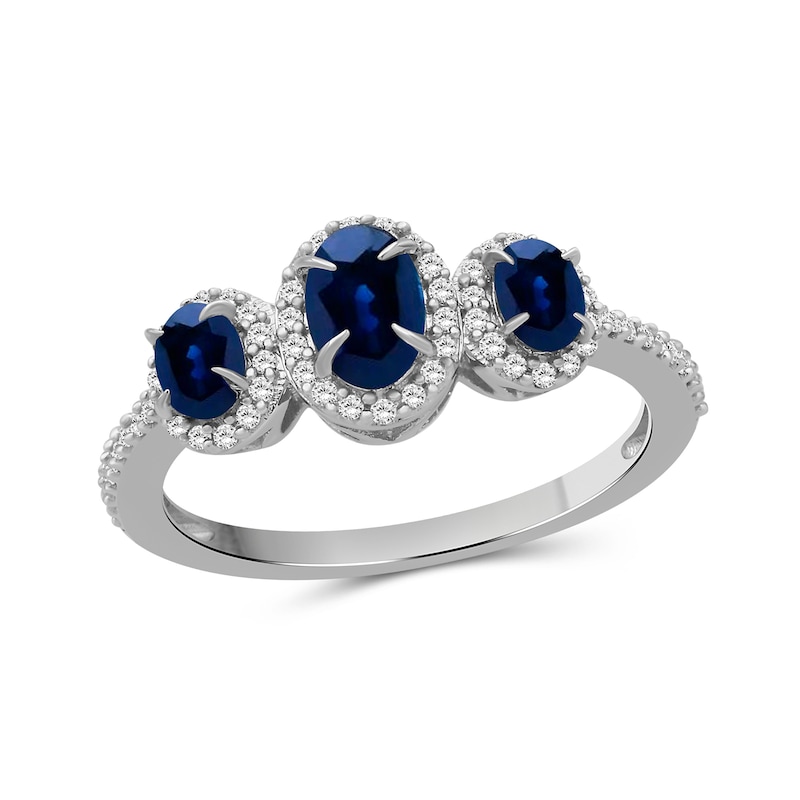 Oval Blue Sapphire and 0.15 CT. T.W. Diamond Three-Stone Frame Ring 10K White Gold