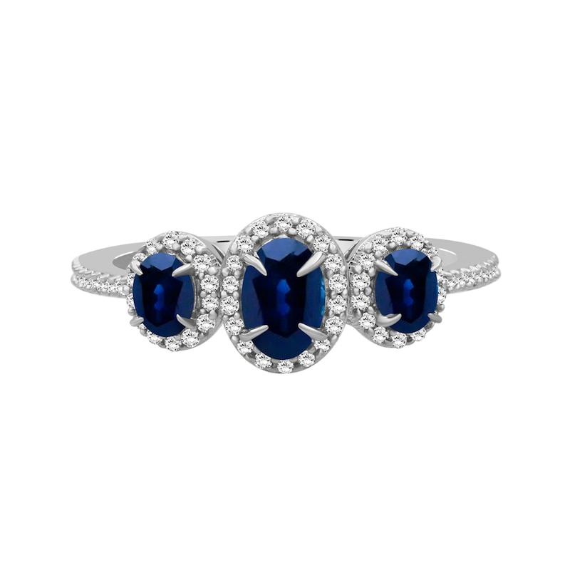 Oval Blue Sapphire and 0.15 CT. T.W. Diamond Three-Stone Frame Ring 10K White Gold