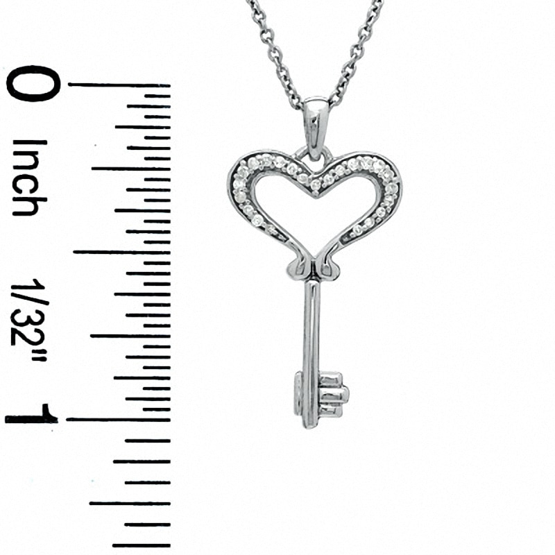 Previously Owned - 0.05 CT. T.W. Diamond Small Heart Key Pendant in Sterling Silver