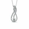 Previously Owned - 0.12 CT. T.W. Diamond Swirl Pendant in Sterling Silver