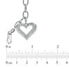 Previously Owned -  Diamond Accent Heart Charm Bracelet in Sterling Silver - 7.5"