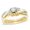 Thumbnail Image 1 of Previously Owned - 0.33 CT. T.W. Diamond Braid Bridal Set in 10K Gold