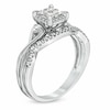 Thumbnail Image 1 of Previously Owned - 0.33 CT. T.W. Quad Diamond Twist Shank Bridal Set in 10K White Gold