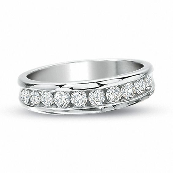 Previously Owned  025 CT Tw Channel Set Diamond Wedding Band in