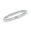 Thumbnail Image 1 of Previously Owned - 0.10 CT. T.W. Diamond Wavy Anniversary Band in 10K White Gold