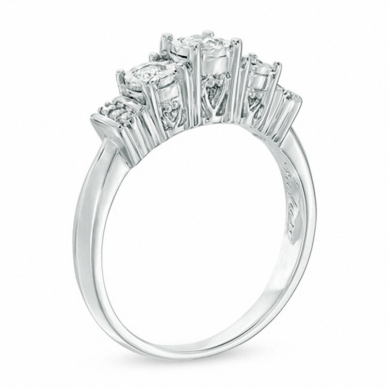 Previously Owned - 0.25 CT. T.W. Diamond Three Stone Ring in 10K White Gold