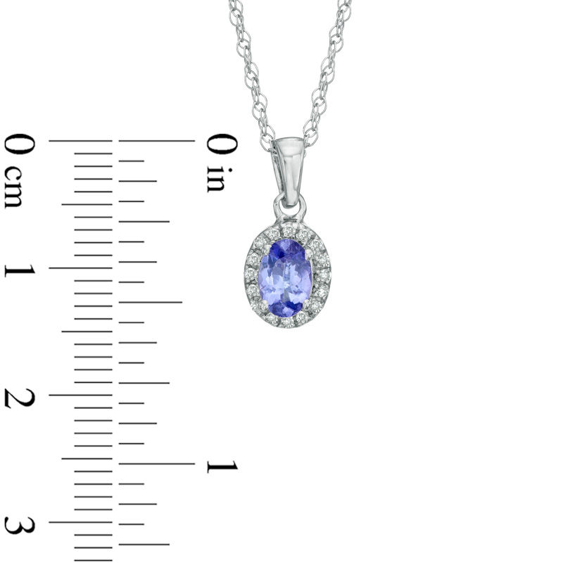 Previously Owned - Oval Tanzanite and Diamond Accent Frame Pendant in Sterling Silver