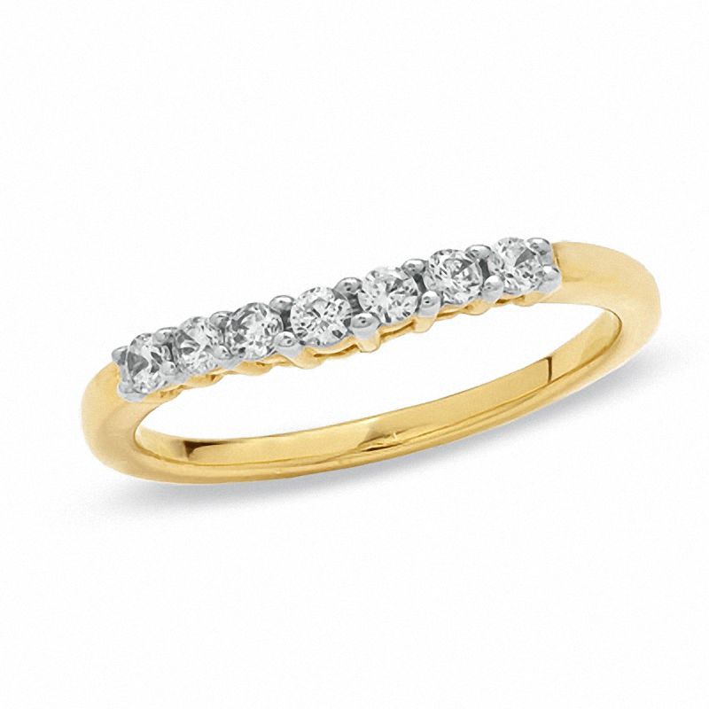 Previously Owned - 0.25 CT. T.W. Diamond Contour Wedding Band in 14K Gold