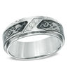 Thumbnail Image 1 of Previously Owned - Men's 0.10 CT. T.W. Diamond Tribal Wedding Band in Two-Tone Stainless Steel