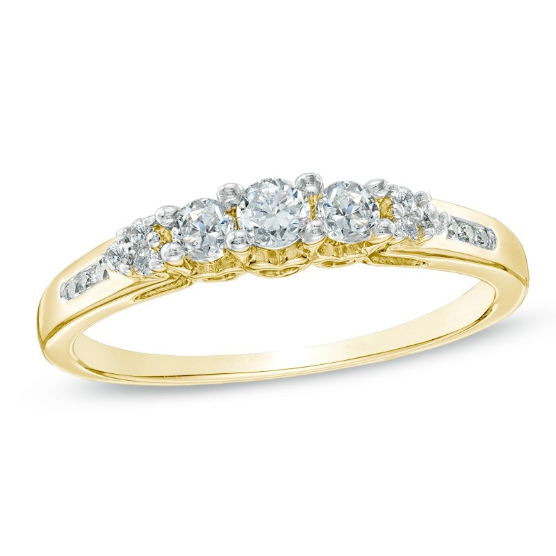 Previously Owned - 0.33 CT. T.W. Diamond Past Present Future Tri-Sides Ring in 14K Gold