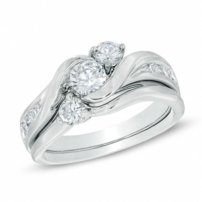 Previously Owned - 1.00 CT. T.W. Diamond Three Stone Slant Bridal Set in 14K White Gold