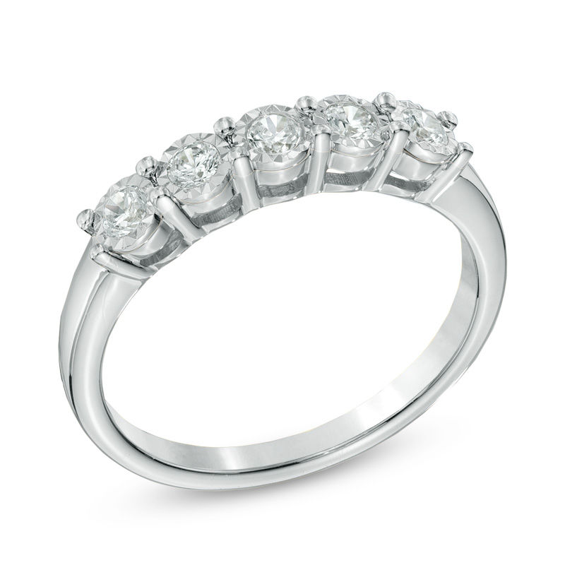 Previously Owned - 0.25 CT. T.W. Diamond Five Stone Wedding Band in 10K White Gold