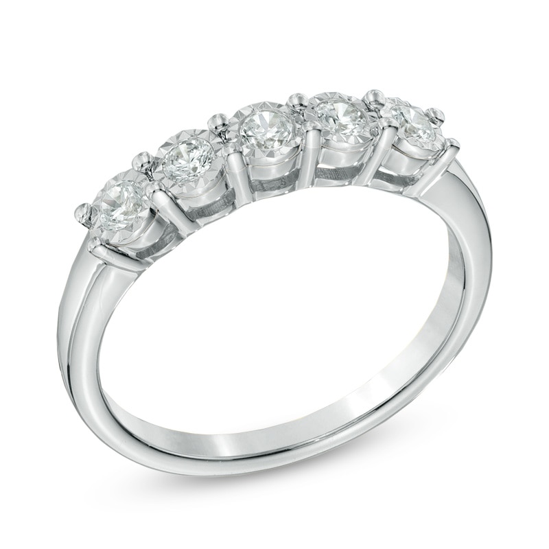 Previously Owned - 0.25 CT. T.W. Diamond Five Stone Wedding Band in 10K White Gold