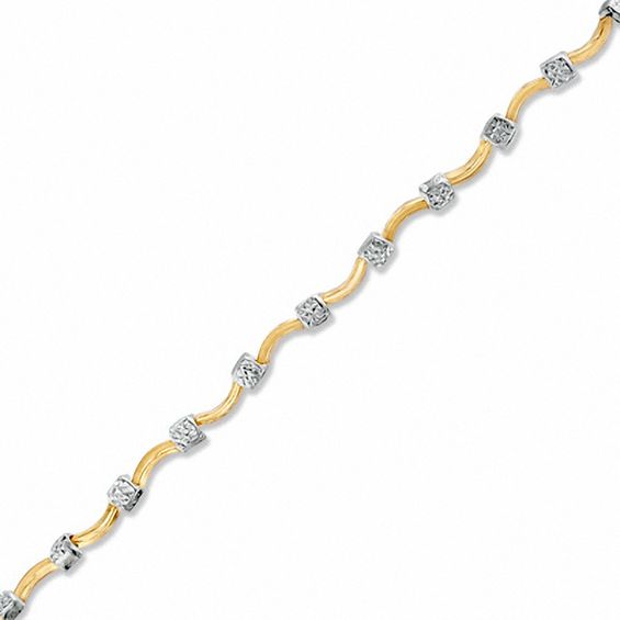 Previously Owned - Curve Station Stampato Bracelet in 10K Two-Tone Gold
