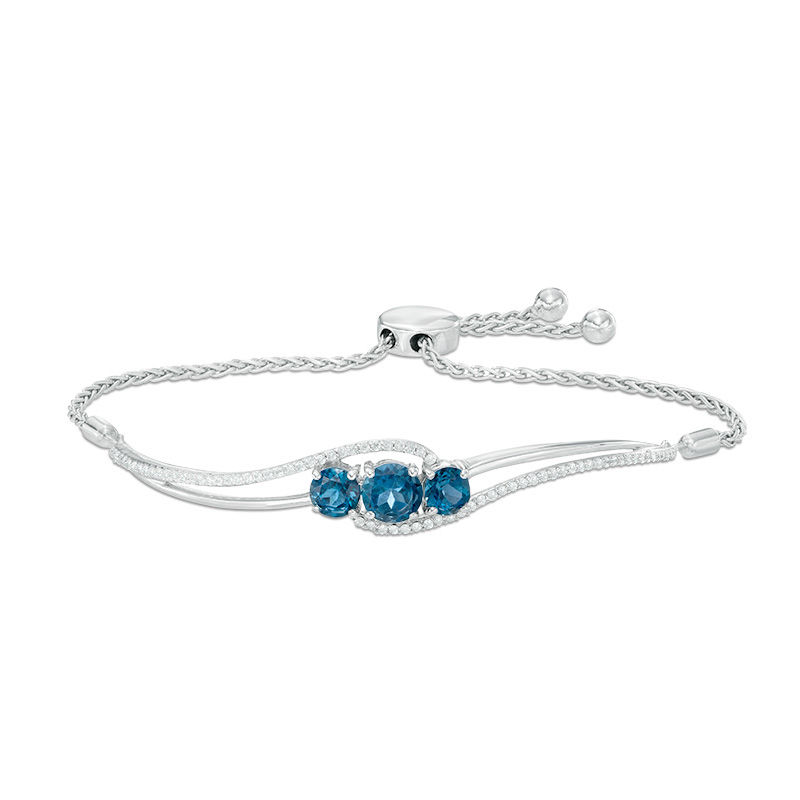 Previously Owned - London Blue Topaz and Lab-Created White Sapphire Three Stone Bolo Bracelet in Sterling Silver - 8.0"