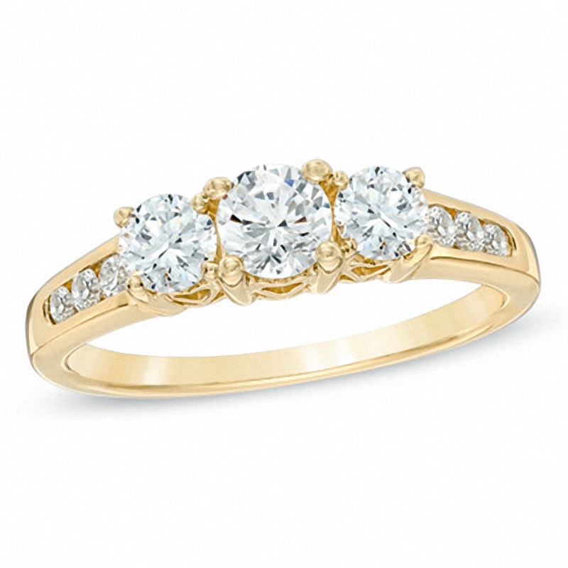 Previously Owned - 1.00 CT. T.W. Diamond Three Stone Past Present Future Engagement Ring in 14K Gold