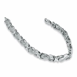 Previously Owned - 0.16 CT. T.W. Diamond Figure 8 and 