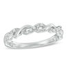 Thumbnail Image 1 of Previously Owned - 0.12 CT. T.W. Diamond Twisting Anniversary Band in 10K White Gold