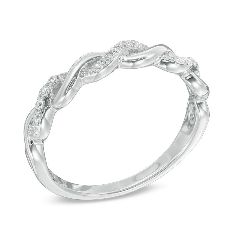 Previously Owned - 0.12 CT. T.W. Diamond Twisting Anniversary Band in 10K White Gold