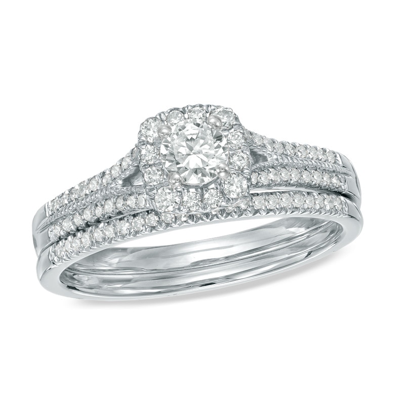Previously Owned - 0.45 CT. T.W. Canadian Diamond Frame Bridal Set in 14K White Gold (I/I2)