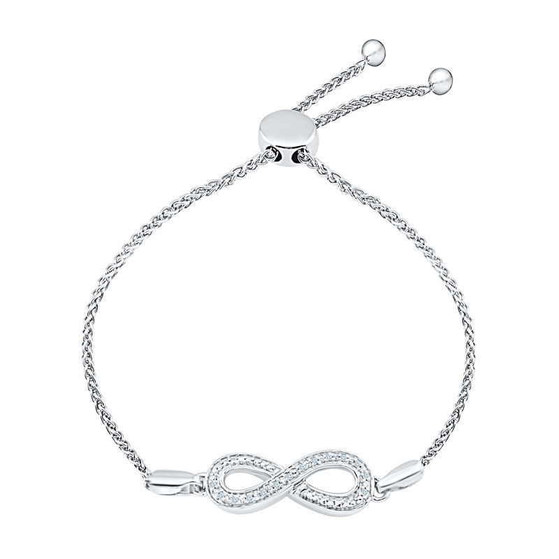 Previously Owned - 0.04 CT. T.W. Diamond Infinity Station Bolo Bracelet in Sterling Silver - 9.5"