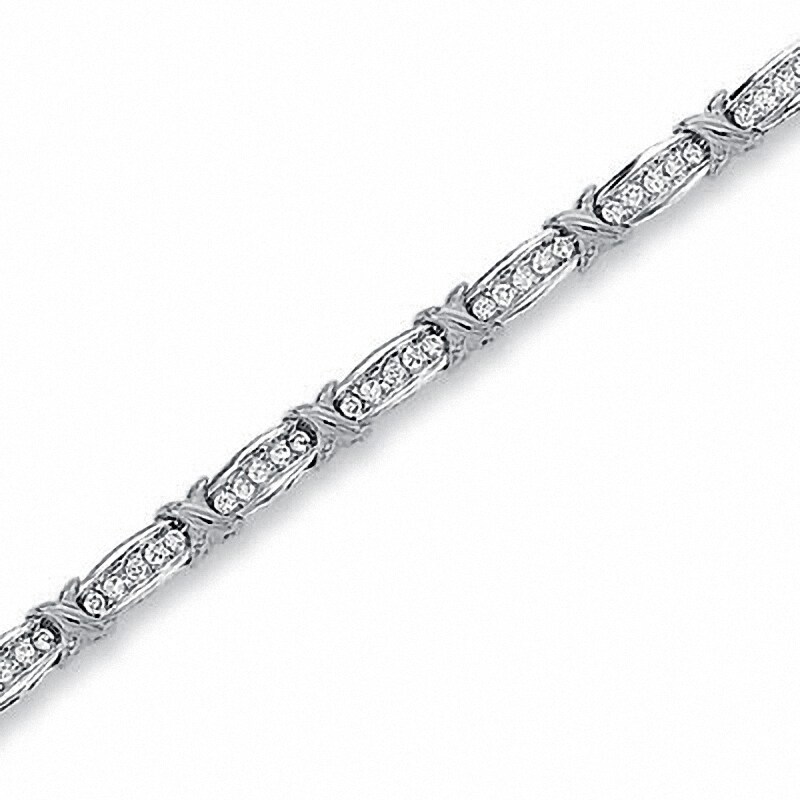 Main Image 1 of Previously Owned - 0.50 CT. T.W. Diamond Channel "X" Bracelet in 10K White Gold