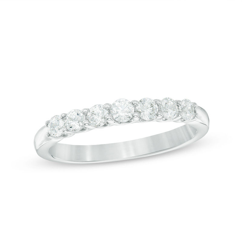 Previously Owned - Celebration  GrandÂ® 0.50 CT. T.W. Diamond Anniversary Band in 14K White Gold (I/I1)