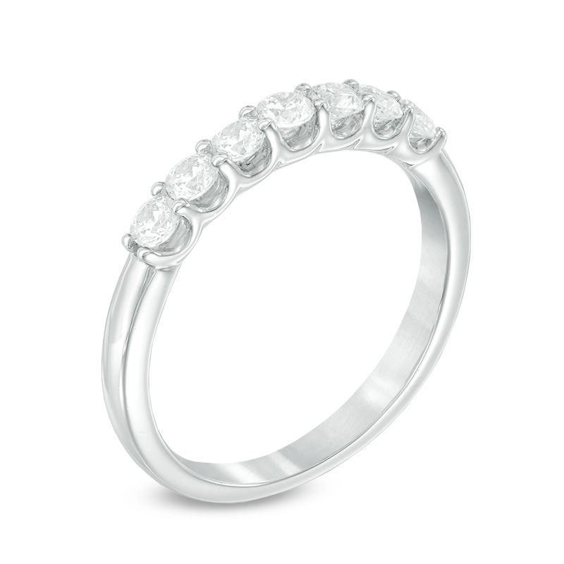 Previously Owned - Celebration  GrandÂ® 0.50 CT. T.W. Diamond Anniversary Band in 14K White Gold (I/I1)