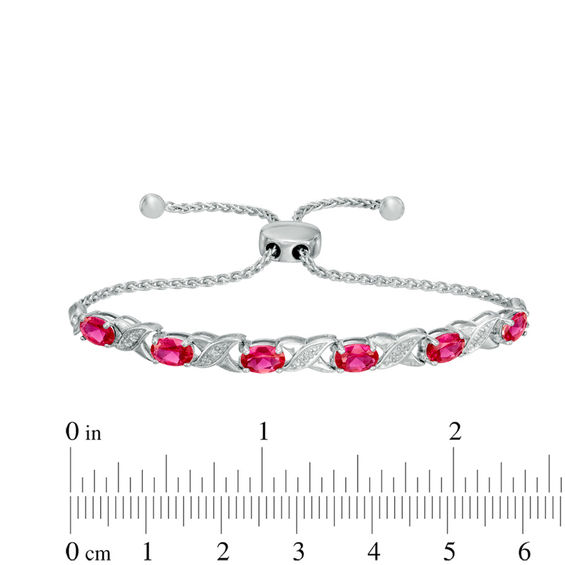 Previously Owned - Oval Lab-Created Ruby and Diamond Accent "XO" Bolo Bracelet in Sterling Silver - 9.5"