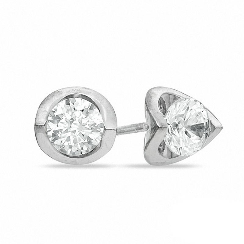 Previously Owned - 0.20 CT. T.W.  Canadian Diamond Tension-Set Earrings in 14K White Gold (I/I2)
