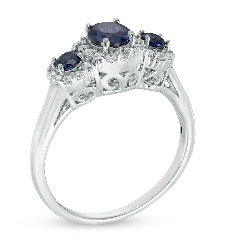 Previously Owned - 5.0mm Lab-Created Blue and White Sapphire Frame Three Stone Ring in 10K White Gold