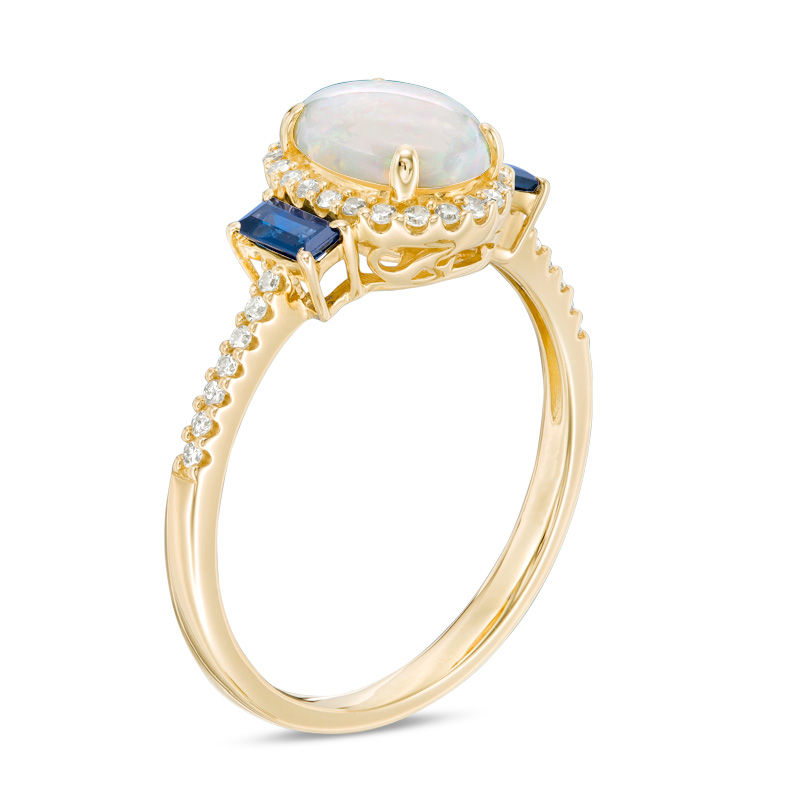 Previously Owned - Oval Opal, Blue Sapphire and 0.10 CT. T.W. Diamond Frame Three Stone Ring in 10K Gold