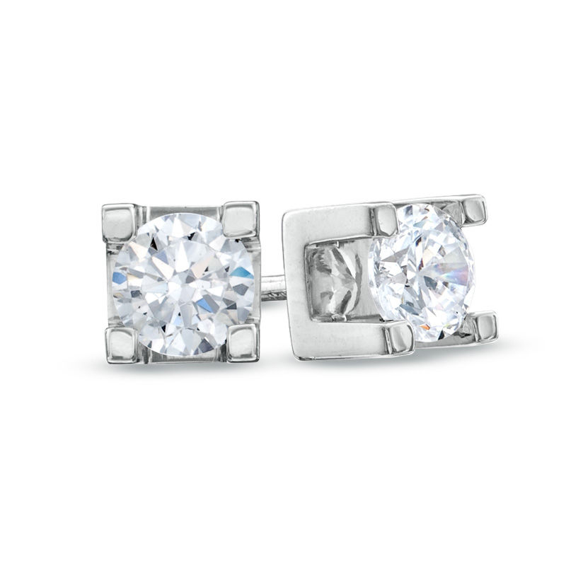 Previously Owned - 0.50 CT. T.W.  Canadian Diamond Solitaire Stud Earrings in 14K White Gold (I/I2)