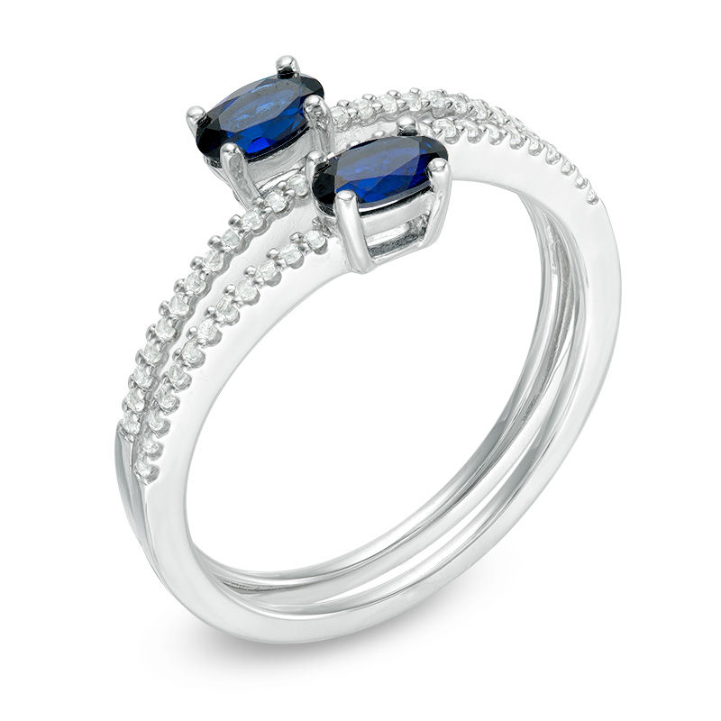 Previously Owned - Oval Lab-Created Blue and White Sapphire Coil Ring in Sterling Silver