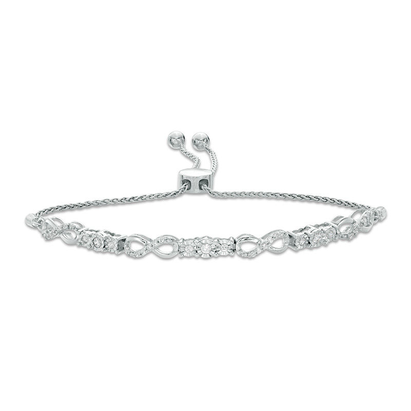 Previously Owned - 0.37 CT. T.W. Diamond Three Stone Infinity Bolo Bracelet in 10K White Gold - 9.5"