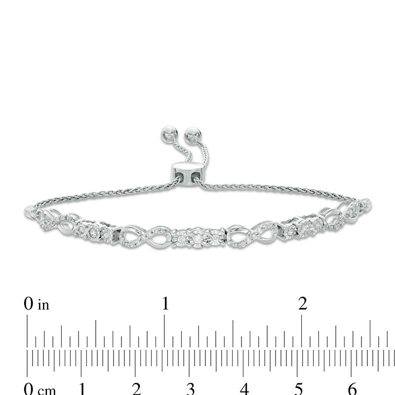 Main Image 2 of Previously Owned - 0.37 CT. T.W. Diamond Three Stone Infinity Bolo Bracelet in 10K White Gold - 9.5&quot;