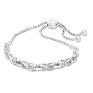 Previously Owned - 0.20 CT. T.W. Diamond "X" Bolo Bracelet in Sterling Silver - 9.5"