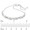 Previously Owned - 0.20 CT. T.W. Diamond "X" Bolo Bracelet in Sterling Silver - 9.5"